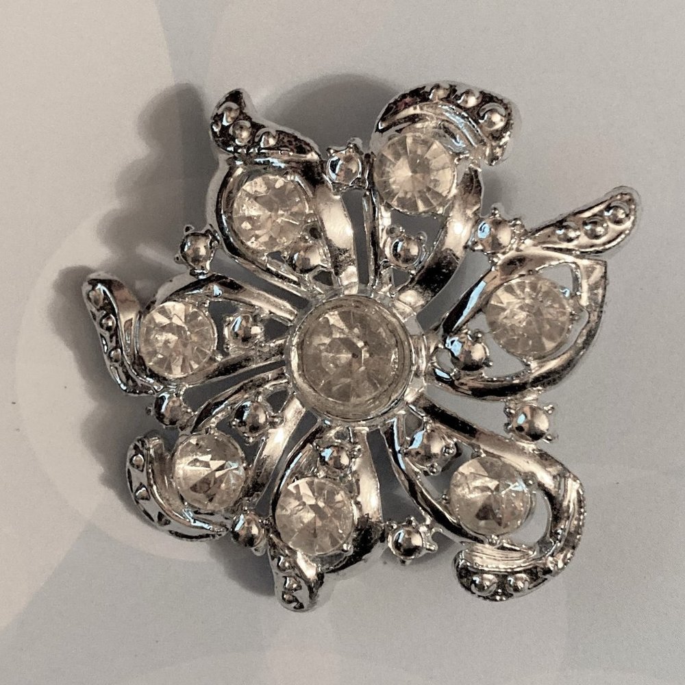 Kicky Silvertone & Rhinestone Costume Brooch